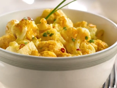 pollo al curry con coliflor